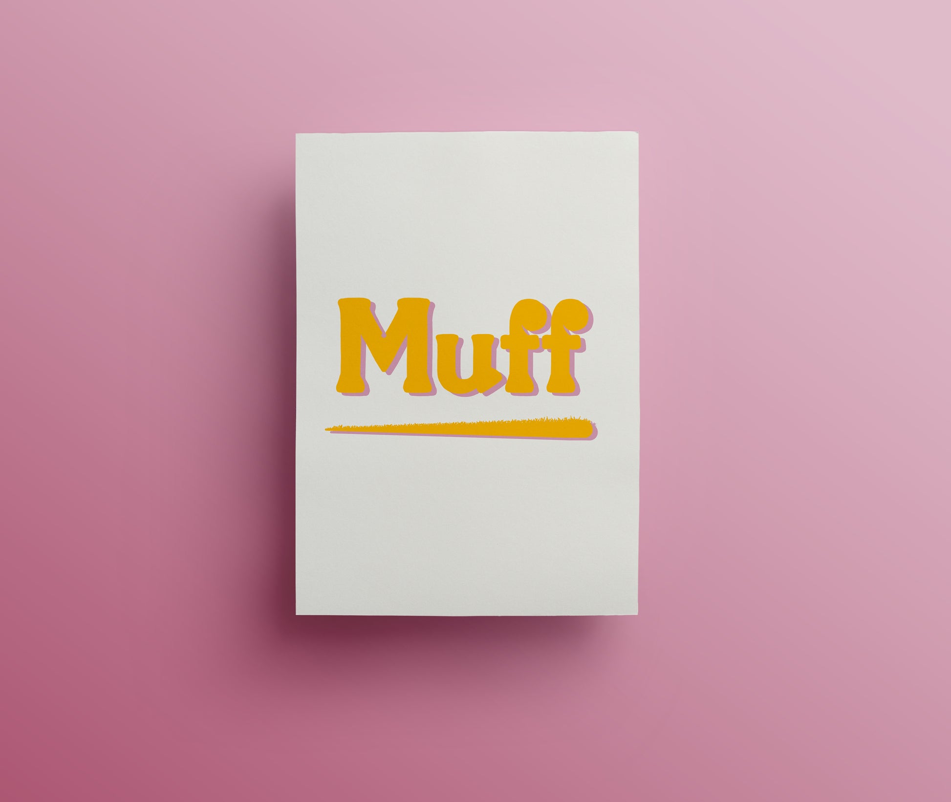 A buff coloured greetings card with the word 'Muff' written in yellow hand drawn lettering on the front. The underline looks soft and slightly furry. 