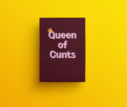 A dark aubergine card with the words Queen of Cunts written in pink and white hand drawn lettering on the front. The Q has a tiny crown.  
