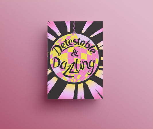 Detestable and Dazzling Hand drawn lettering in black on a yellow and pink disco ball on a black background greetings card
