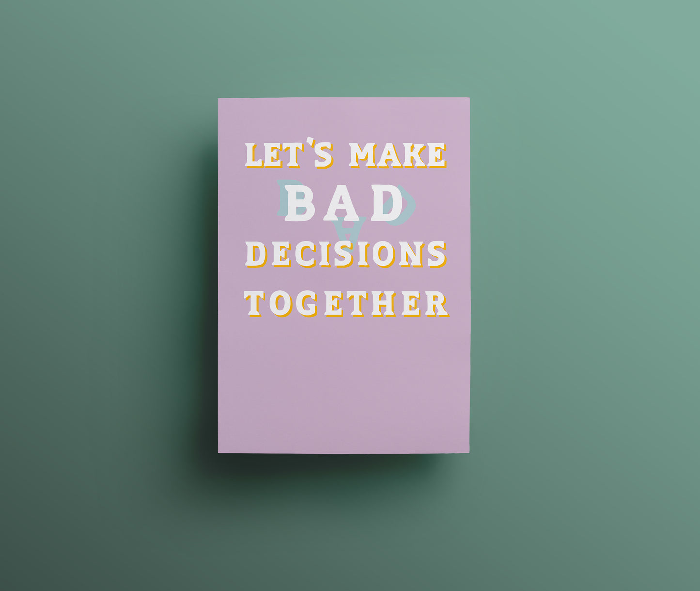 Light purple greetings card with white and yellow hand drawn lettering saying 'Let's make bad decisions together'.