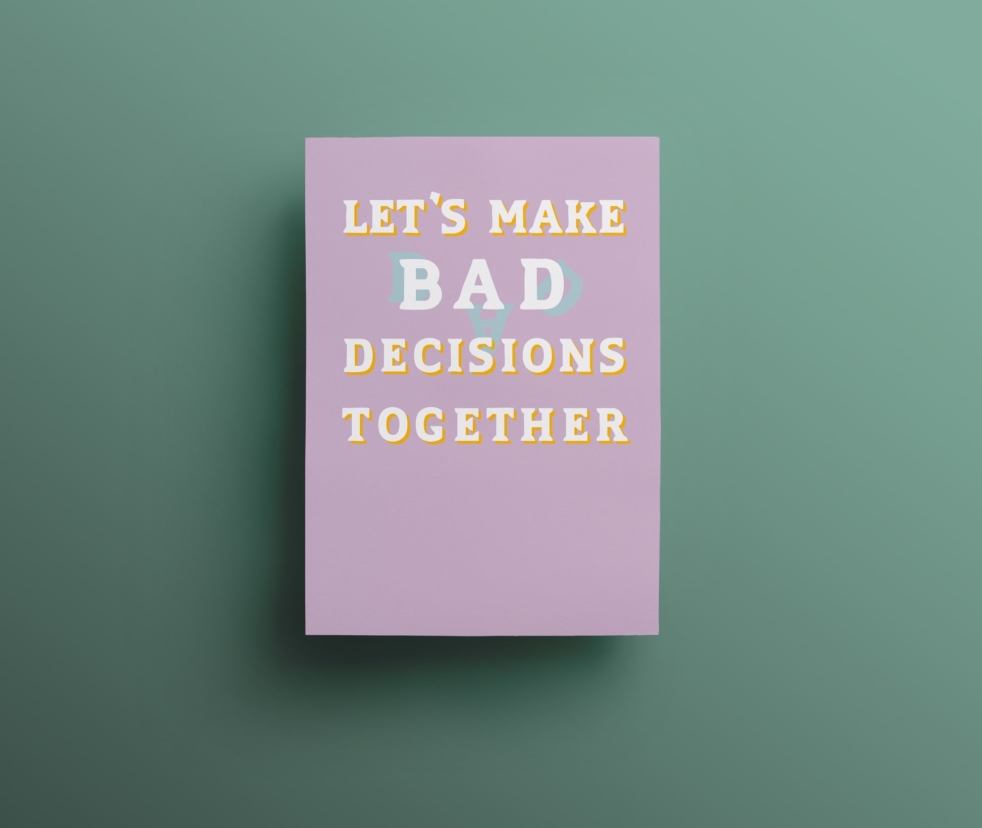 Light purple greetings card with white and yellow hand drawn lettering saying 'Let's make bad decisions together'.